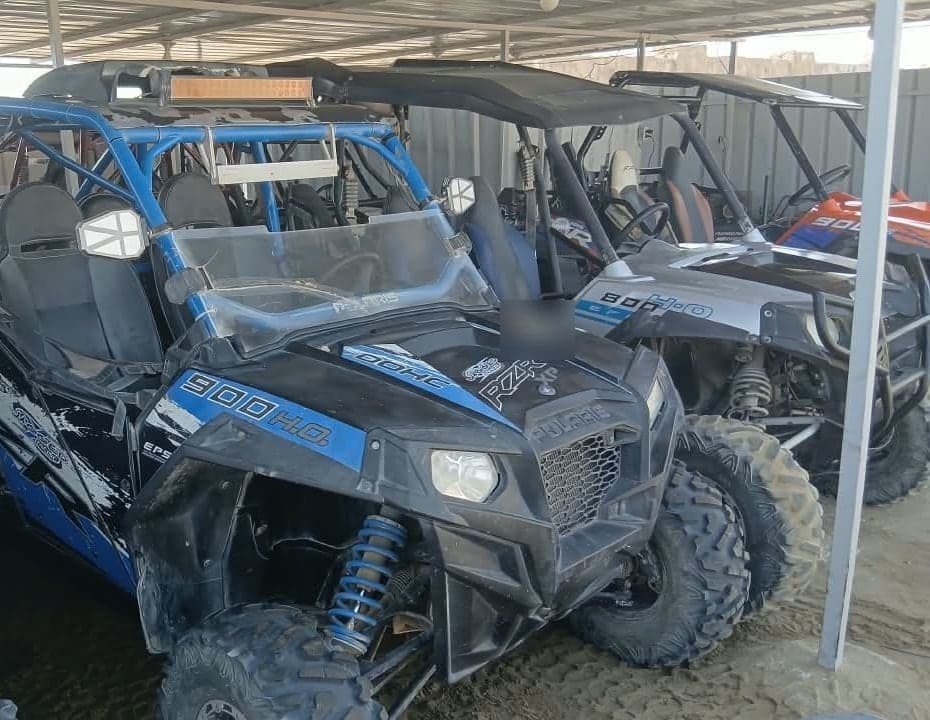 Four-seat off-road buggies ready for a family buggy safari in Marsa Alam