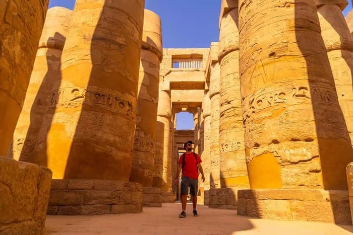 Giant columns of the hypostyle hall at Karnak Temple on a Luxor day trip from Marsa Alam